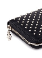 Detail View -Click To Enlarge Skull charm stud leather continental wallet