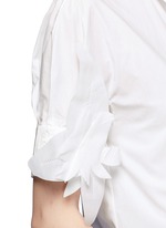 Detail View -Click To Enlarge Starched floral appliqué brooch poplin shirt
