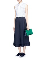 Figure View -Click To Enlarge Starched floral appliqué poplin sleeveless shirt