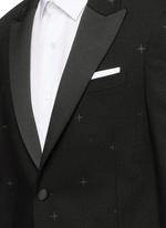 Detail View -Click To Enlarge Rubberised star print tuxedo blazer