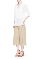 Figure View -Click To Enlarge 'Limtally B' drawstring V-neck open knit top