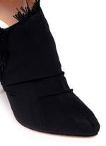 Detail View -Click To Enlarge Asymmetric fringe suede booties