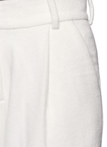 Detail View -Click To Enlarge Pleated wide leg felted wool trousers
