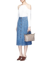 Click To Enlarge 'Zoey' small floral cutout perforated leather satchel