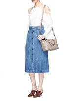 Figure View -Click To Enlarge 'Zoey' small floral cutout perforated leather satchel