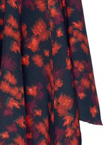 Detail View -Click To Enlarge Cutout mermaid hem floral print skirt