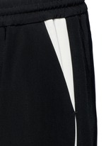 Detail View -Click To Enlarge Contrast pocket stripe elastic twill pants