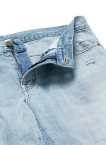 Click To Enlarge Repaired knee patch distressed skinny jeans