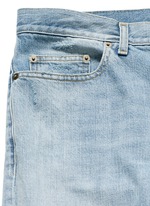Click To Enlarge Repaired knee patch distressed skinny jeans