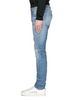 Detail View -Click To Enlarge Destroyed knee patch skinny jeans