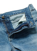 Click To Enlarge Destroyed knee patch skinny jeans