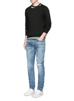 Figure View -Click To Enlarge Destroyed knee patch skinny jeans