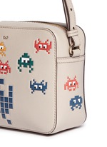 Detail View -Click To Enlarge 'Space Invaders' embossed leather crossbody bag