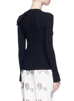 Back View -Click To Enlarge Ruffle cutout shoulder rib knit top