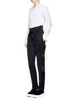 Figure View -Click To Enlarge Tassel side virgin wool pants