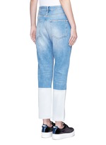 Back View -Click To Enlarge Dipped hem whiskered jeans