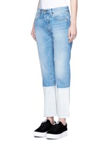 Front View -Click To Enlarge Dipped hem whiskered jeans