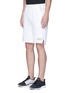Front View - Click To Enlarge - DYNE - x PRINCE lasercut perforated panel performance shorts
