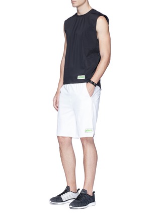 Figure View - Click To Enlarge - DYNE - x PRINCE lasercut perforated panel performance shorts