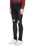 Front View - Click To Enlarge - AMIRI - 'Thrasher' waxed slim fit ripped jeans
