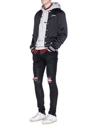 Figure View - Click To Enlarge - AMIRI - 'Thrasher' waxed slim fit ripped jeans