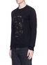 Front View - Click To Enlarge - ALEXANDER MCQUEEN - 'Punk Skull' metal ring distressed sweater