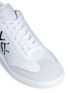 Detail View - Click To Enlarge - ISABEL MARANT - 'Bryce' graffiti logo print metallic collar leather sneakers