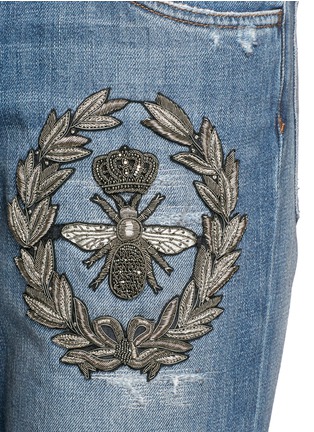 Detail View - Click To Enlarge - - - Bee crest embellished jeans