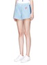 Front View - Click To Enlarge - ÊTRE CÉCILE - 'Retro' logo embroidered drawstring denim shorts