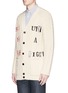 Front View - Click To Enlarge - VALENTINO GARAVANI - x Jamie Reid slogan embroidered cable knit cardigan