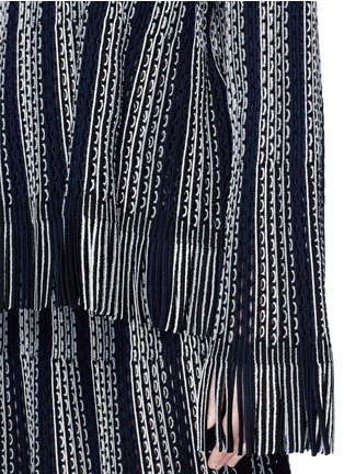Detail View - Click To Enlarge - ALAÏA - 'Gladiator' perforated fringed hem oversized sweater