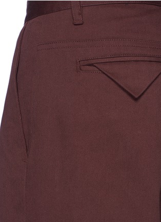 Detail View - Click To Enlarge - SIKI IM / DEN IM - 'Ponyboy' face embroidered frayed cuff chinos