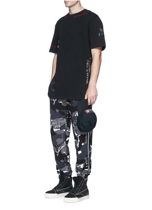 Figure View - Click To Enlarge - HACULLA - Camouflage print scribble embroidered sweatpants