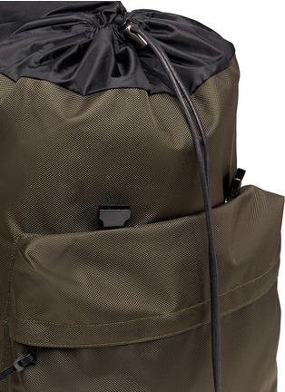  - 10016 - Buckled ballistic nylon drawstring backpack