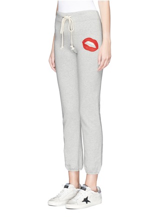 Front View - Click To Enlarge - SANDRINE ROSE - 'The Sweat Pants' in slogan patch fleece jersey
