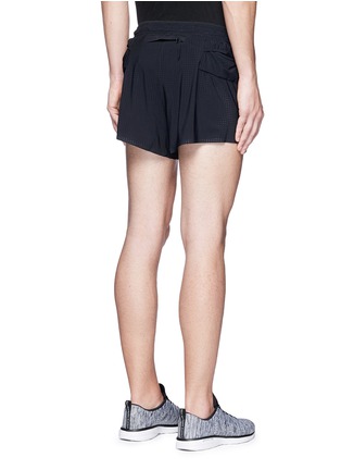 Back View - Click To Enlarge - SATISFY - 'Long Distance 2.5"' perforated running shorts