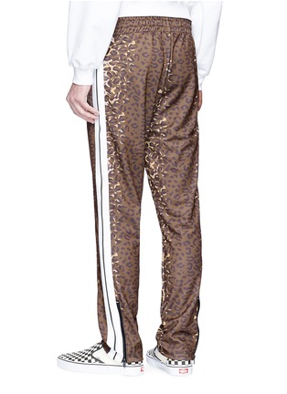 Back View - Click To Enlarge - PALM ANGELS - Leopard print track pants