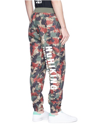 Back View - Click To Enlarge - ADIDAS BY PHARRELL WILLIAMS - 'Hu Hiking' camouflage print sweatpants