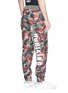 Back View - Click To Enlarge - ADIDAS BY PHARRELL WILLIAMS - 'Hu Hiking' camouflage print sweatpants