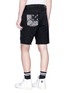 Back View - Click To Enlarge - AMIRI - Art patch ripped denim shorts