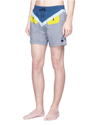Figure View - Click To Enlarge - FENDI SPORT - 'Bag Bugs' appliqué swim shorts