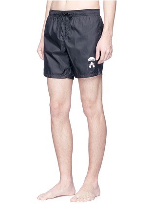 Figure View - Click To Enlarge - FENDI SPORT - 'Karlito' patch swim shorts