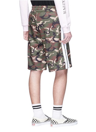 Back View - Click To Enlarge - PALM ANGELS - Stripe outseam camouflage print shorts