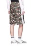 Back View - Click To Enlarge - PALM ANGELS - Stripe outseam camouflage print shorts