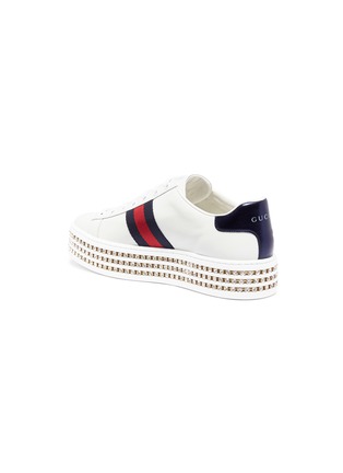 Detail View - Click To Enlarge - GUCCI - 'Ace' slogan appliqué leather glass crystal embellished flatform sneakers