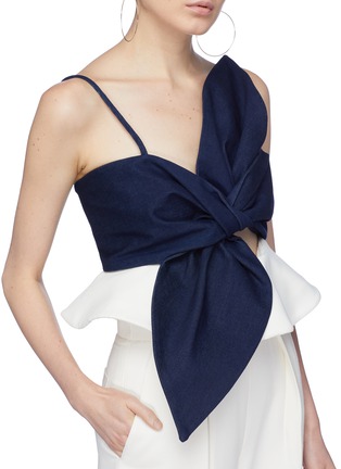 Detail View - Click To Enlarge - LEAL DACCARETT - 'Anika' cutout bow tie peplum top