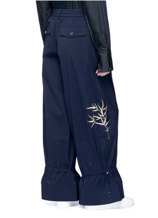  - ANGEL CHEN - Leaf embroidered flared leg unisex jogging pants