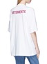 Back View - Click To Enlarge - VETEMENTS - 'Staff' unisex print T-shirt