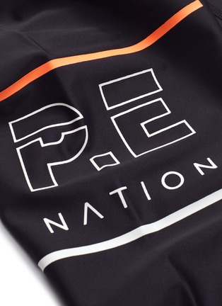  - P.E NATION - 'Glory' logo print performance leggings
