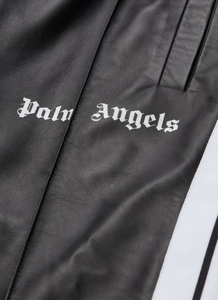  - PALM ANGELS - Stripe outseam pintucked leather track pants